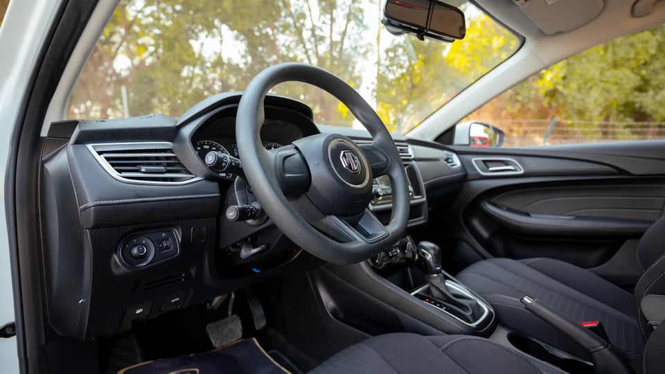 Used 2022 MG 5 Comfort in White – Driver Side Dashboard & Steering View for Sale at First Choice Cars Dubai Sharjah