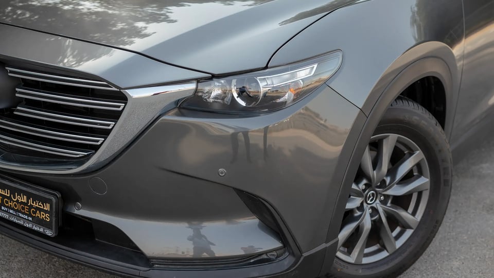 Used 2020 Mazda CX-9 GT in Grey – Headlight Close-up for Sale at First Choice Cars Dubai Sharjah