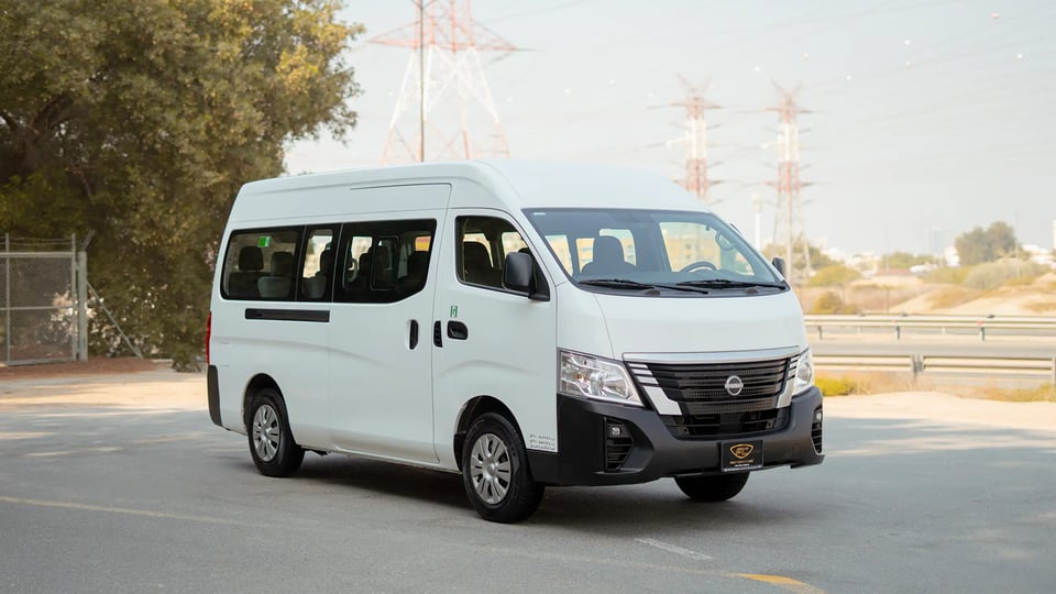 Used 2024 Nissan Urvan High Roof in White – Right Front Diagonal (45°) View for Sale at First Choice Cars Dubai Sharjah