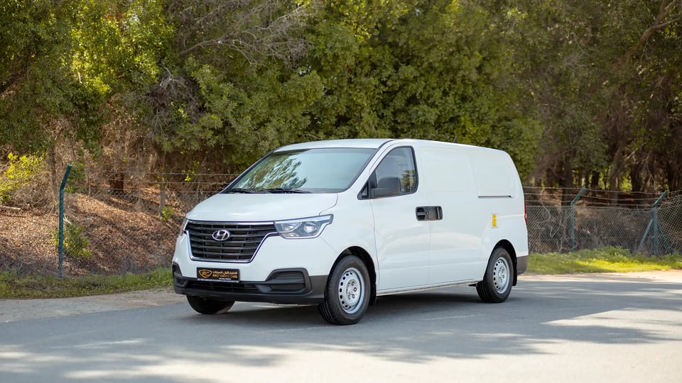 Used 2021 Hyundai H1 Cargo Van in White – Left Front Diagonal (45°) View for Sale at First Choice Cars Dubai Sharjah
