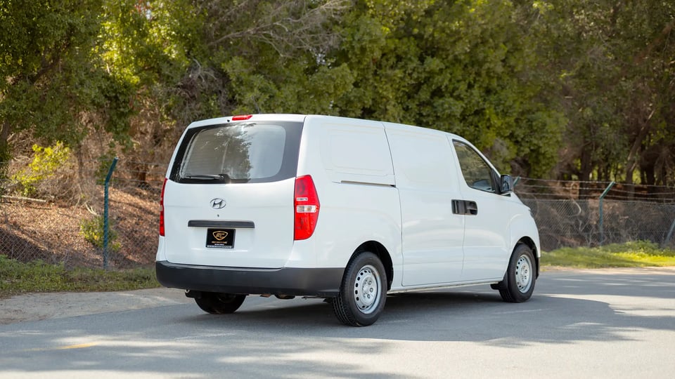 Used 2021 Hyundai H1 Cargo Van in White – Right Back Diagonal (45°) View for Sale at First Choice Cars Dubai Sharjah