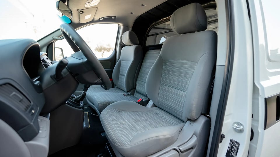 Used 2021 Hyundai H1 Cargo Van in White – Front Driver Side Cabin View for Sale at First Choice Cars Dubai Sharjah