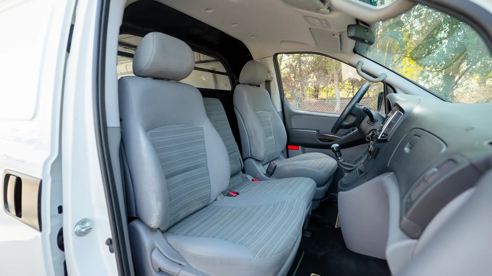 Used 2021 Hyundai H1 Cargo Van in White – Front Passenger Side Cabin View for Sale at First Choice Cars Dubai Sharjah