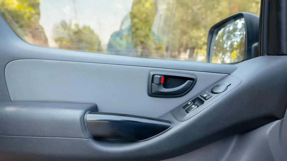 Used 2021 Hyundai H1 Cargo Van in White – Driver Door Panel Full View for Sale at First Choice Cars Dubai Sharjah