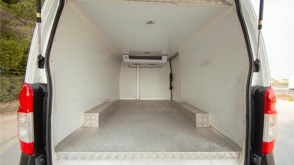 Used 2021 Nissan Urvan Standard Roof in White – Chiller Box Rear Opening View for Sale at First Choice Cars Dubai Sharjah
