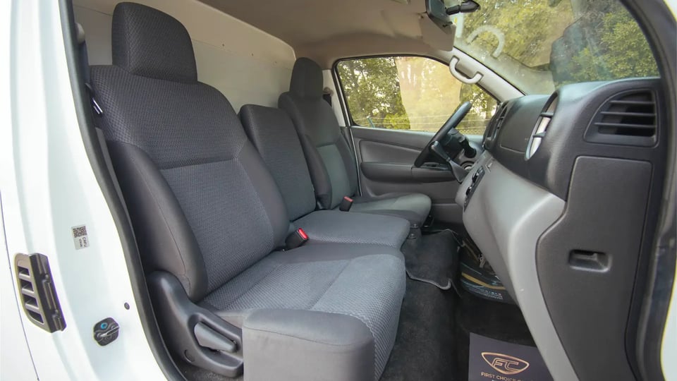 Used 2021 Nissan Urvan Standard Roof in White – Front Passenger Side Cabin View for Sale at First Choice Cars Dubai Sharjah