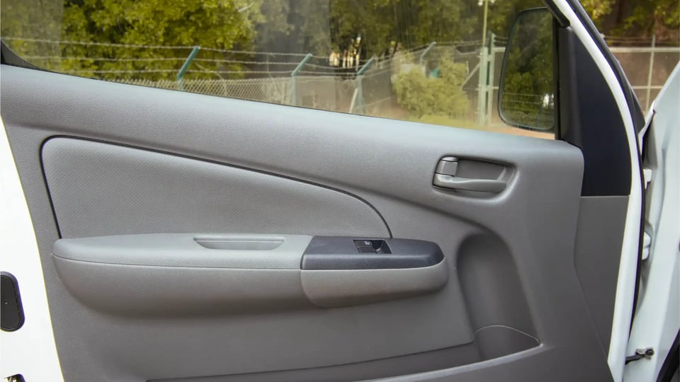 Used 2021 Nissan Urvan Standard Roof in White – Driver Door Panel Full View for Sale at First Choice Cars Dubai Sharjah