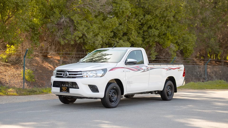 Used 2022 Toyota Hilux GLX Single Cabin in White – Left Front Diagonal (45°) View for Sale at First Choice Cars Dubai Sharjah