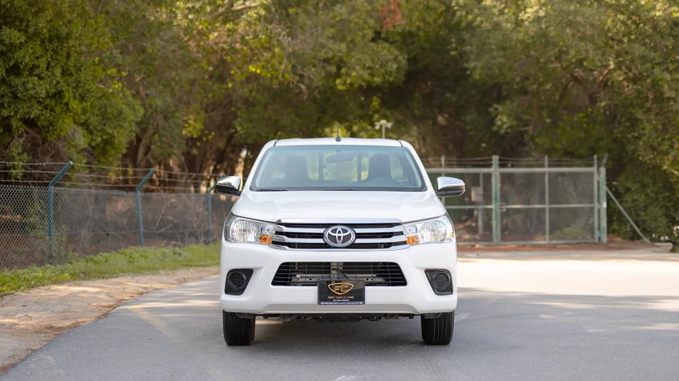 Used 2022 Toyota Hilux GLX Single Cabin in White – Front View for Sale at First Choice Cars Dubai Sharjah