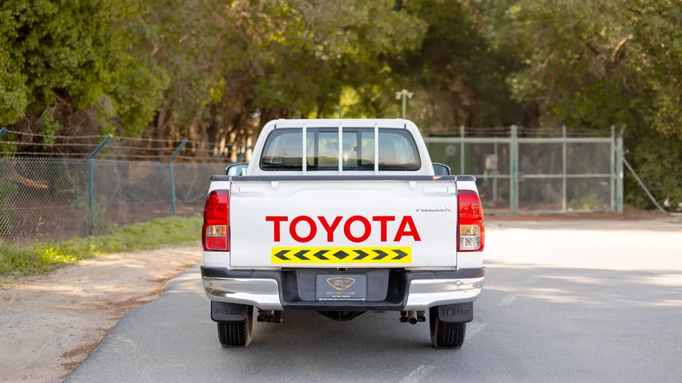 Used 2022 Toyota Hilux GLX Single Cabin in White – Back/Rear View for Sale at First Choice Cars Dubai Sharjah