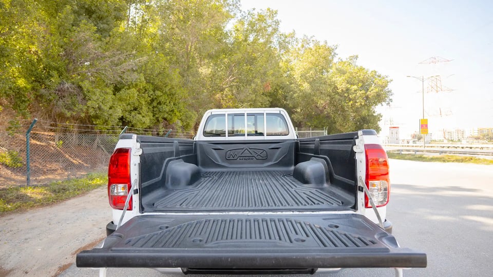 Used 2022 Toyota Hilux GLX Single Cabin in White – Boot / Trunk Space Open View for Sale at First Choice Cars Dubai Sharjah