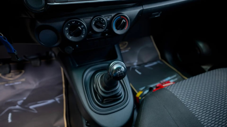 Used 2022 Toyota Hilux GLX Single Cabin in White – Center Console & Gear Shifter for Sale at First Choice Cars Dubai Sharjah