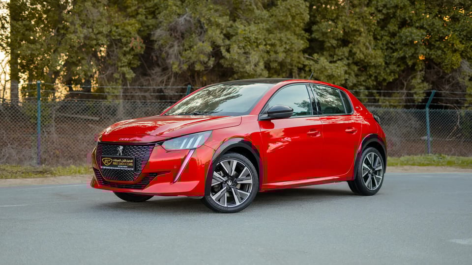 Used 2023 Peugeot 208 GT in Red – Left Front Diagonal (45°) View for Sale at First Choice Cars Dubai Sharjah