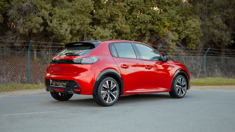 Used 2023 Peugeot 208 GT in Red – Right Back Diagonal (45°) View for Sale at First Choice Cars Dubai Sharjah