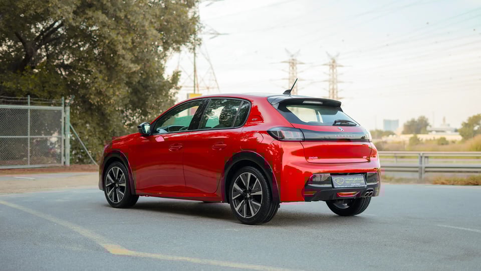 Used 2023 Peugeot 208 GT in Red – Left Back Diagonal (45°) View for Sale at First Choice Cars Dubai Sharjah