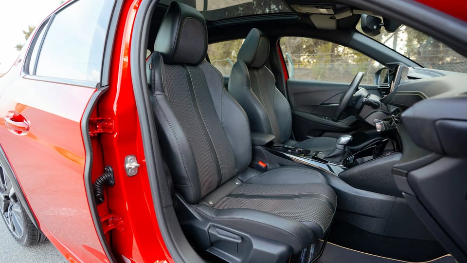 Used 2023 Peugeot 208 GT in Red – Front Passenger Side Cabin View for Sale at First Choice Cars Dubai Sharjah
