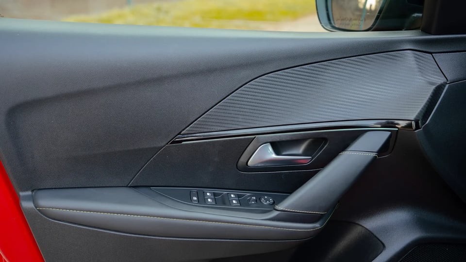 Used 2023 Peugeot 208 GT in Red – Driver Door Panel Full View for Sale at First Choice Cars Dubai Sharjah