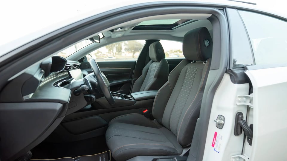 Used 2023 Peugeot 508 Allure in White – Front Driver Side Cabin View for Sale at First Choice Cars Dubai Sharjah