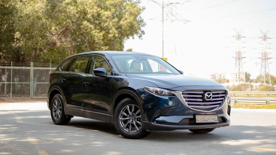 Used 2023 Mazda CX-9 GT in Blue – Right Front Diagonal (45°) View for Sale at First Choice Cars Dubai Sharjah