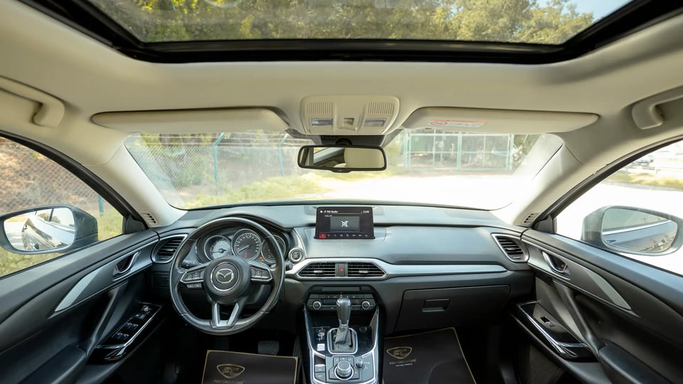 Used 2023 Mazda CX-9 GT in Blue – Front Cabin / Dashboard Full View for Sale at First Choice Cars Dubai Sharjah