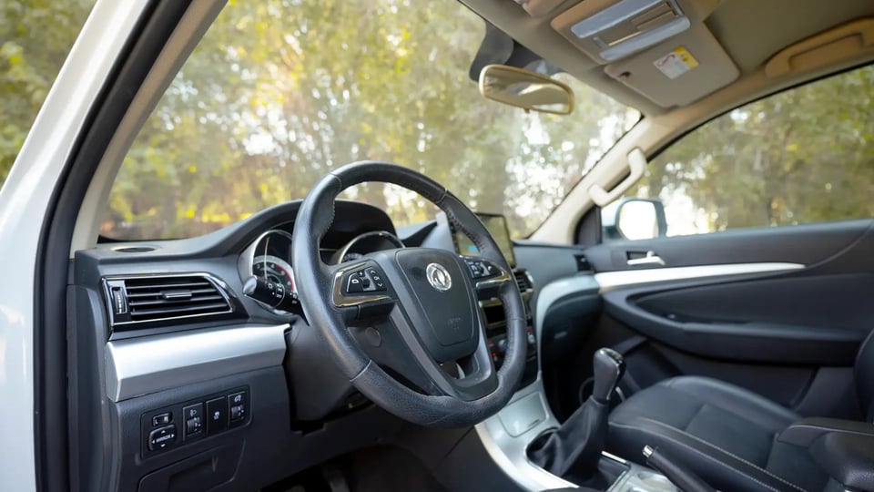 Used 2024 Dongfeng Rich 6 Double Cabin in White – Driver Side Dashboard & Steering View for Sale at First Choice Cars Dubai Sharjah