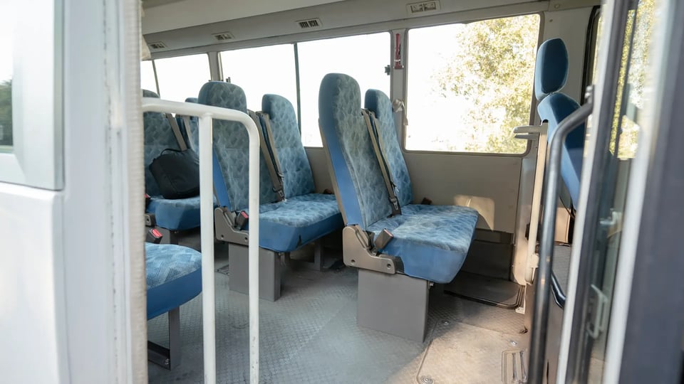 Used 2022 Mitsubishi Rosa Standard in White – Rear Passenger Side Cabin View for Sale at First Choice Cars Dubai Sharjah