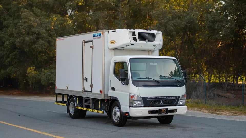 Used 2016 Mitsubishi Canter Freezer Box in White – Right Front Diagonal (45°) View for Sale at First Choice Cars Dubai Sharjah