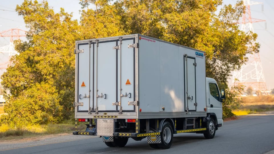 Used 2016 Mitsubishi Canter Freezer Box in White – Right Back Diagonal (45°) View for Sale at First Choice Cars Dubai Sharjah