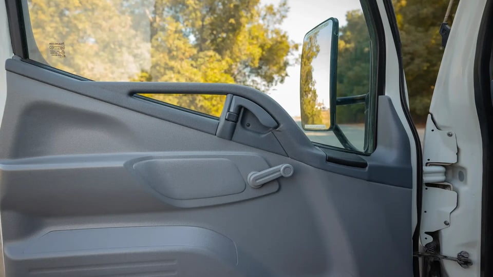 Used 2016 Mitsubishi Canter Freezer Box in White – Driver Door Panel Full View for Sale at First Choice Cars Dubai Sharjah