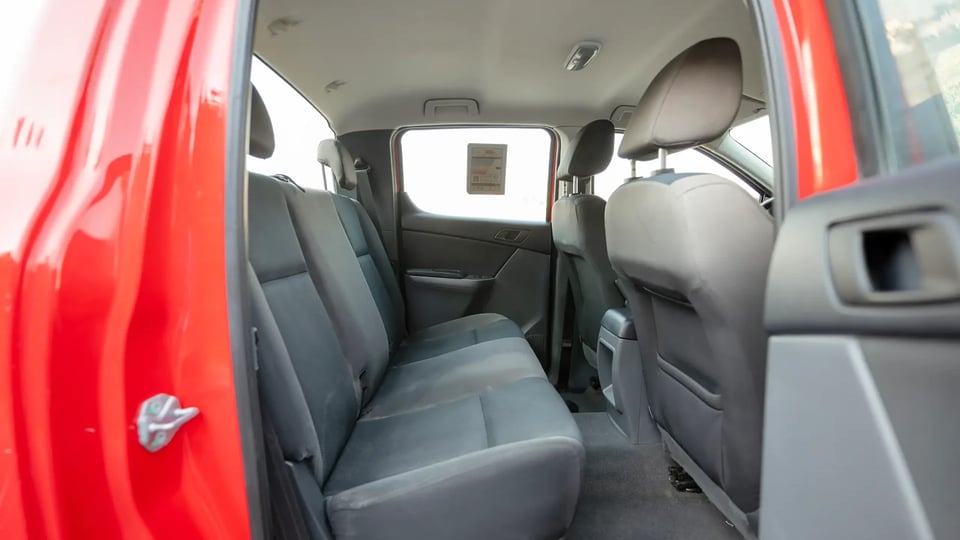 Used 2019 Mazda BT-50 XS in Red – Rear Passenger Side Cabin View for Sale at First Choice Cars Dubai Sharjah