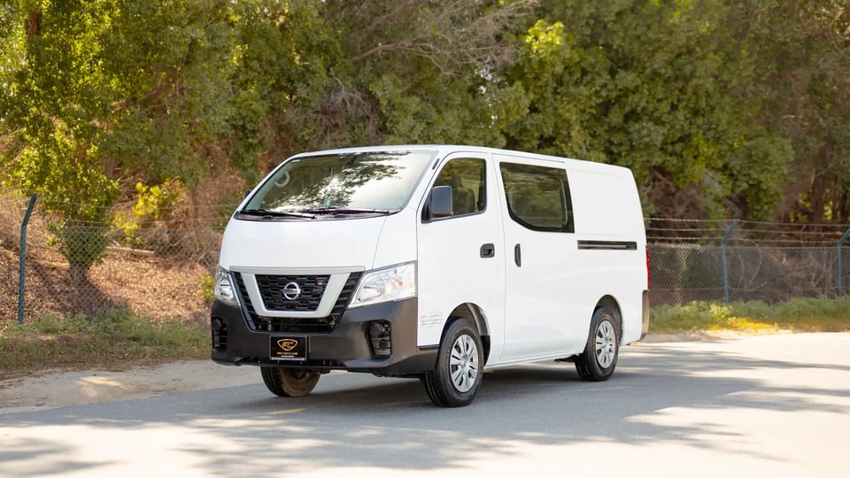 Used 2022 Nissan Urvan Standard Roof in White – Left Front Diagonal (45°) View for Sale at First Choice Cars Dubai Sharjah