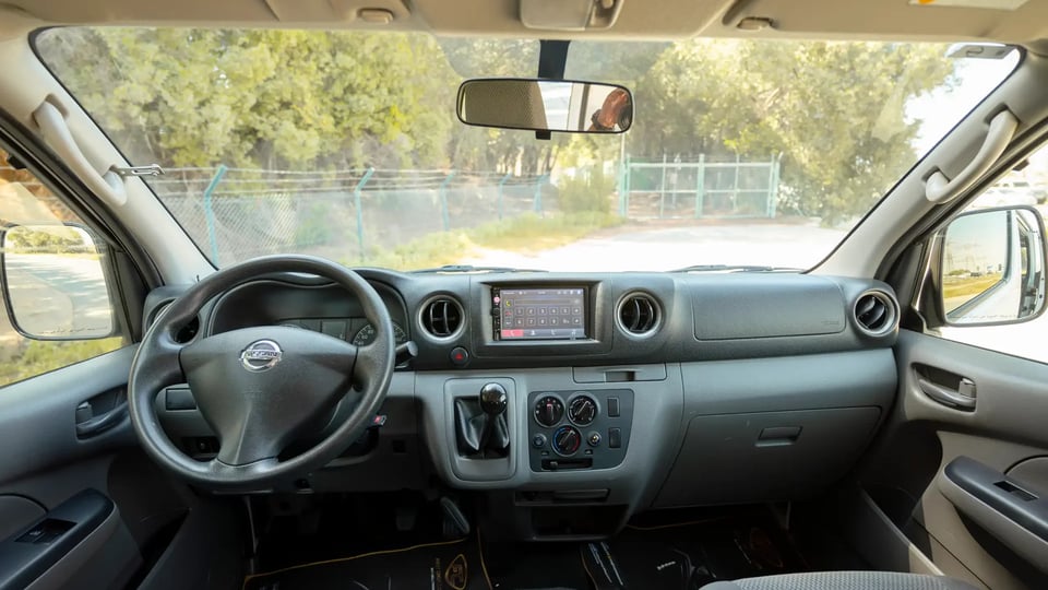 Used 2022 Nissan Urvan Standard Roof in White – Front Cabin / Dashboard Full View for Sale at First Choice Cars Dubai Sharjah