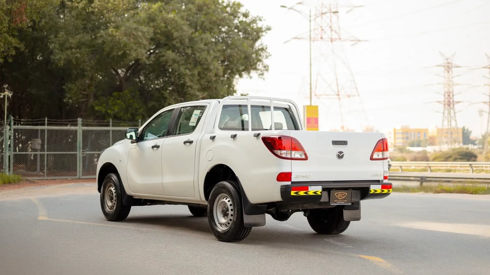 Used 2020 Mazda BT-50 XS in White – Left Back Diagonal (45°) View for Sale at First Choice Cars Dubai Sharjah