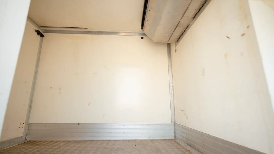 Used 2020 Mitsubishi Canter Freezer Box in White – Chiller Box Right Side Interior View for Sale at First Choice Cars Dubai Sharjah