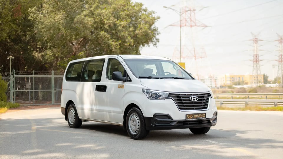 Used 2021 Hyundai H1 12-Seater Wagon in White – Right Front Diagonal (45°) View for Sale at First Choice Cars Dubai Sharjah