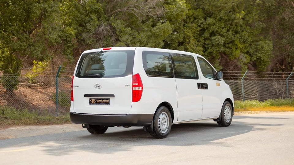 Used 2021 Hyundai H1 12-Seater Wagon in White – Right Back Diagonal (45°) View for Sale at First Choice Cars Dubai Sharjah