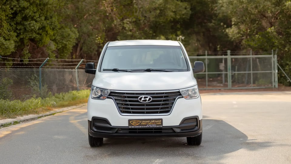 Used 2021 Hyundai H1 12-Seater Wagon in White – Front View for Sale at First Choice Cars Dubai Sharjah