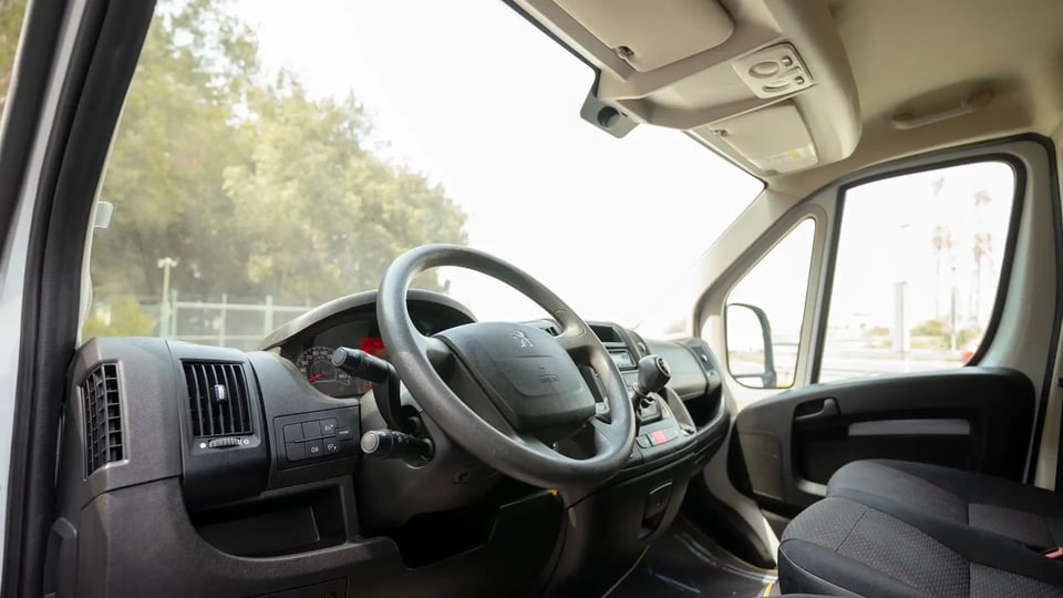 Used 2023 Peugeot Boxer L2h2 in White – Driver Side Dashboard & Steering View for Sale at First Choice Cars Dubai Sharjah