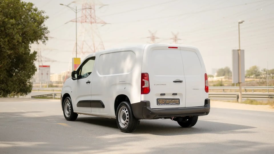 Used 2022 Peugeot Partner Standard in White – Left Back Diagonal (45°) View for Sale at First Choice Cars Dubai Sharjah