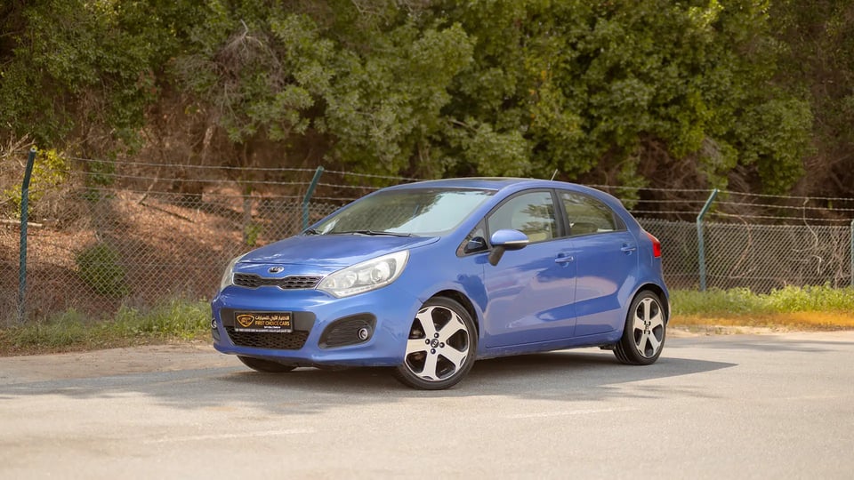 Used 2015 Kia Rio EX in Blue – Left Front Diagonal (45°) View for Sale at First Choice Cars Dubai Sharjah