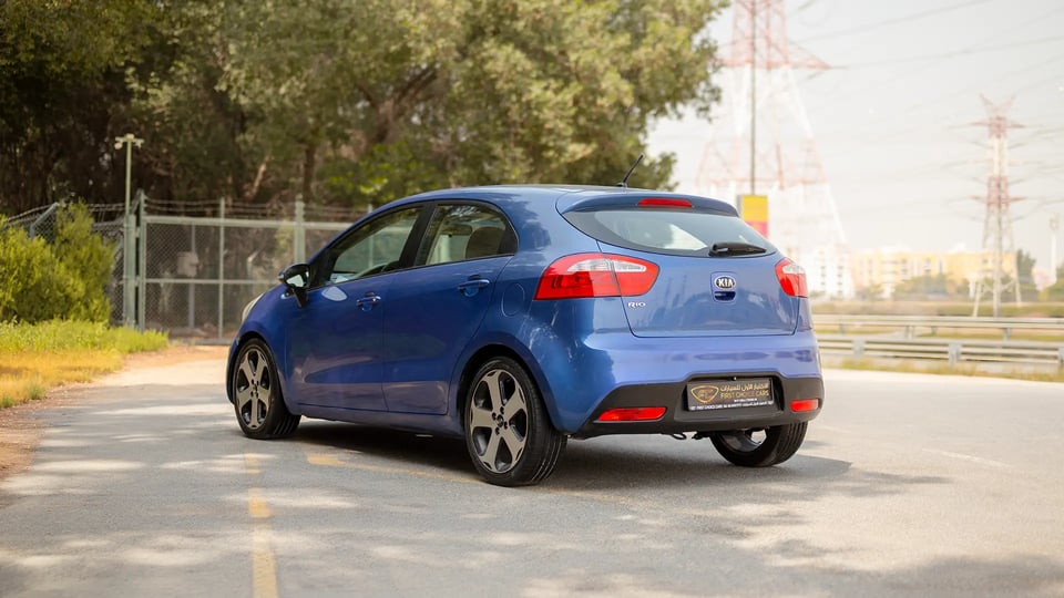 Used 2015 Kia Rio EX in Blue – Left Back Diagonal (45°) View for Sale at First Choice Cars Dubai Sharjah