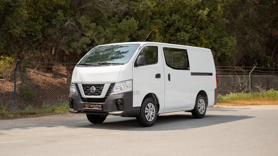 Used 2022 Nissan Urvan Standard Roof in White – Left Front Diagonal (45°) View for Sale at First Choice Cars Dubai Sharjah