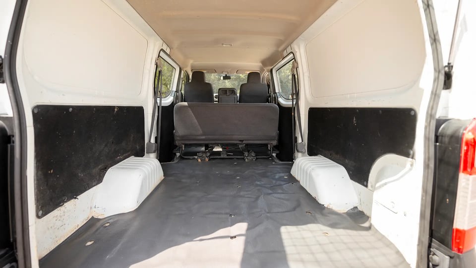 Used 2022 Nissan Urvan Standard Roof in White – Delivery Box Rear Opening View for Sale at First Choice Cars Dubai Sharjah