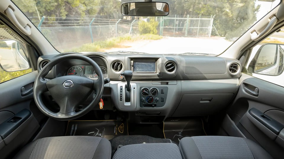 Used 2022 Nissan Urvan Standard Roof in White – Front Cabin / Dashboard Full View for Sale at First Choice Cars Dubai Sharjah