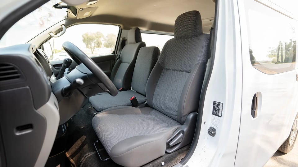 Used 2022 Nissan Urvan Standard Roof in White – Front Driver Side Cabin View for Sale at First Choice Cars Dubai Sharjah