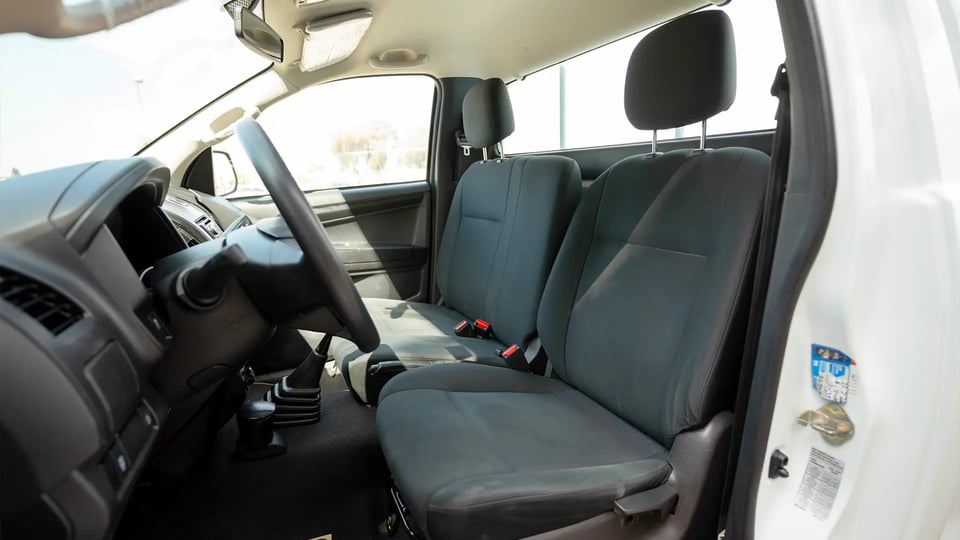 Used 2024 Isuzu D-MAX Single Cabin in White – Front Driver Side Cabin View for Sale at First Choice Cars Dubai Sharjah