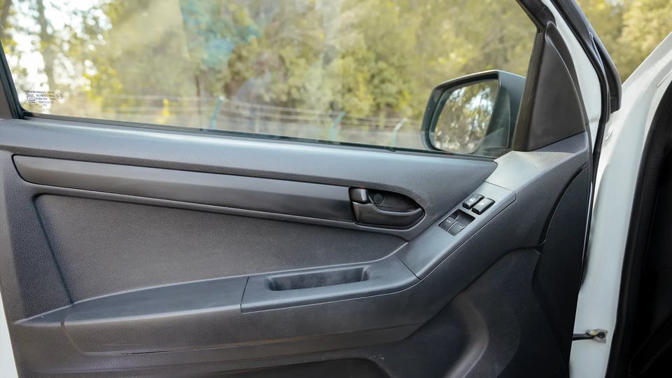 Used 2024 Isuzu D-MAX Single Cabin in White – Driver Door Panel Full View for Sale at First Choice Cars Dubai Sharjah