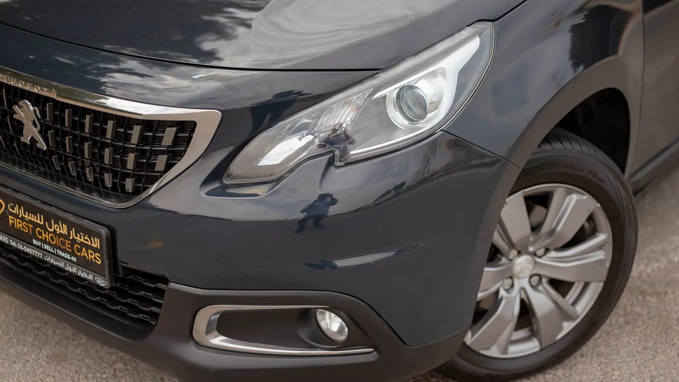 Used 2020 Peugeot 2008 Active in Black – Headlight Close-up for Sale at First Choice Cars Dubai Sharjah
