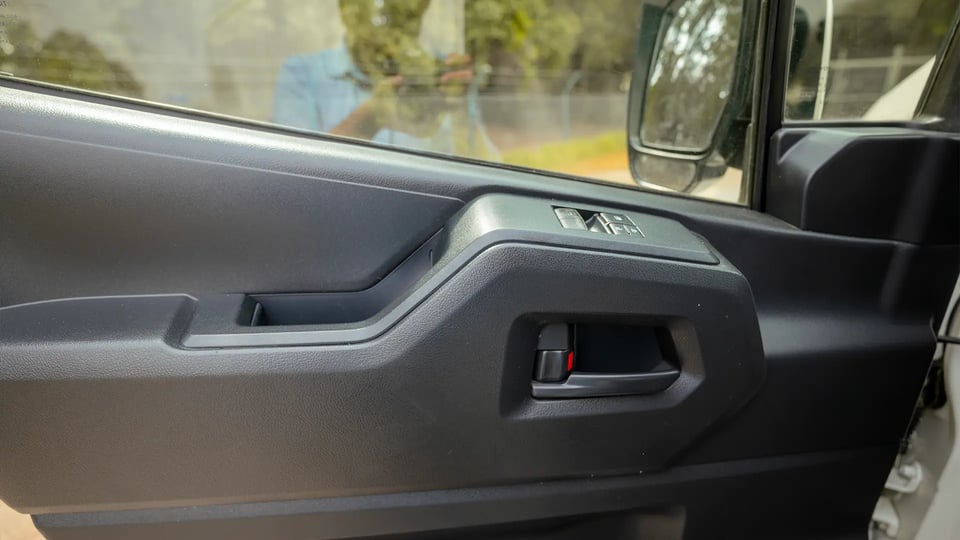 Used 2020 Toyota Hiace GLX High Roof in White – Driver Door Panel Full View for Sale at First Choice Cars Dubai Sharjah