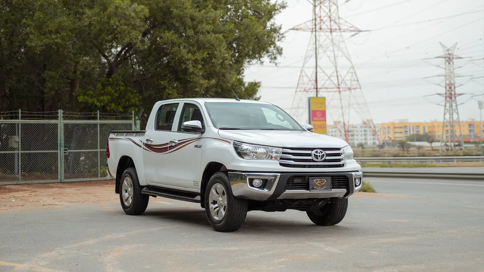 Used 2019 Toyota Hilux DLX Double Cabin in White – Right Front Diagonal (45°) View for Sale at First Choice Cars Dubai Sharjah